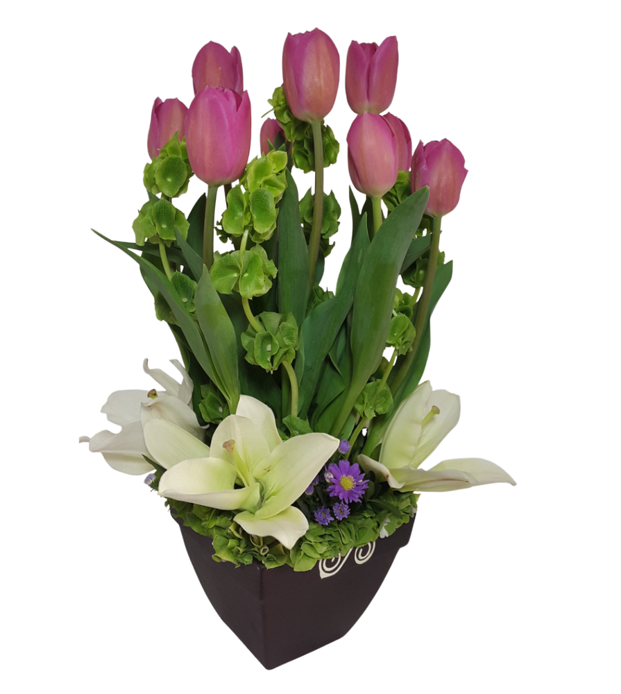 Arreglo floral elegante compuesto por 10 piezas de tulipanes holandeses y alstroemerias blancas colocadas en una base de cerámica color chocolate, haz tu pedido en Liliana online.